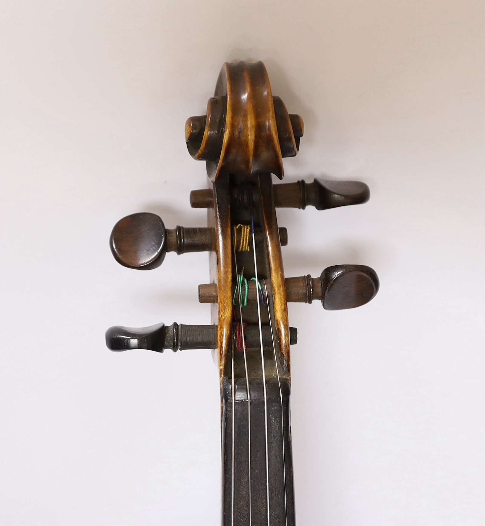 An early 20th century English violin stamped Norman Duke, London, one piece back with wax seal, cased, violin 60cm long